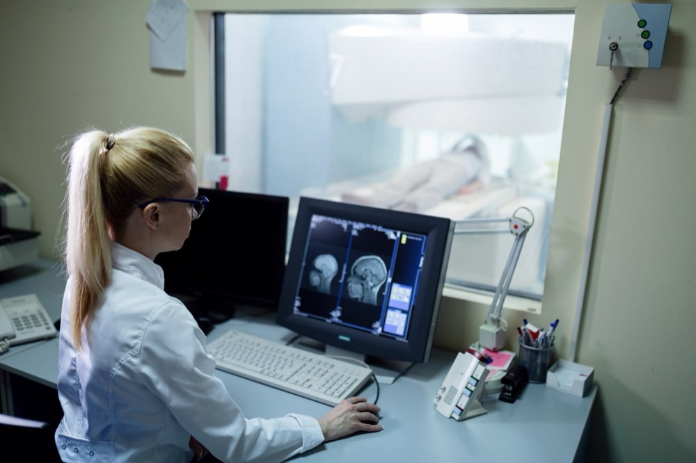 Radiologist reviewing a brain MRI